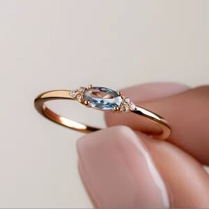 Elegant Gold Ring with Blue Accent